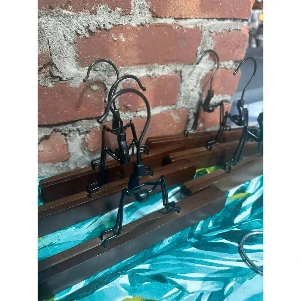 6 Wooden, 1 Metal Clothing Hangers
